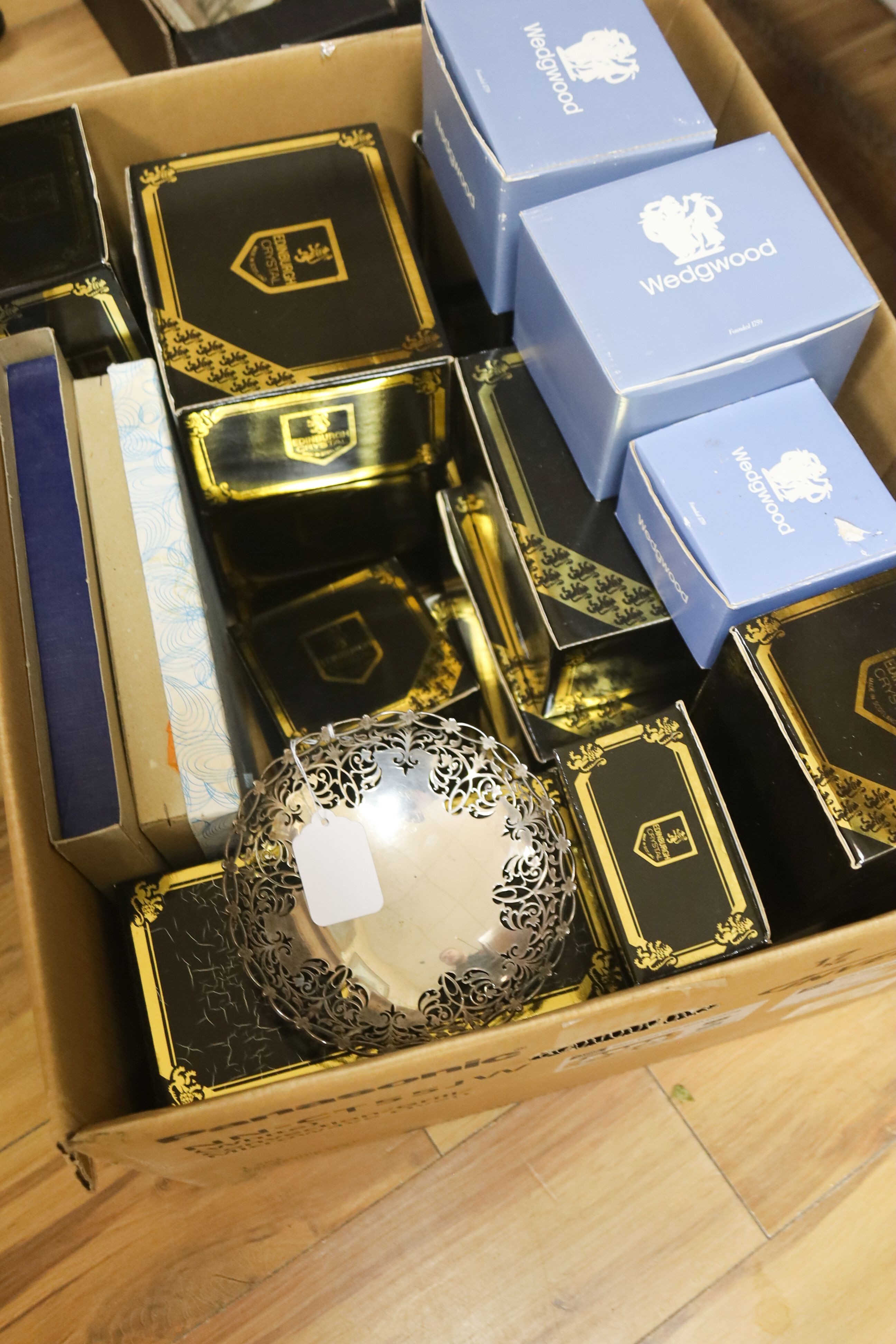An assortment of ceramic and glass tableware. Also to include 18 pierced silver sweetmeet dishes